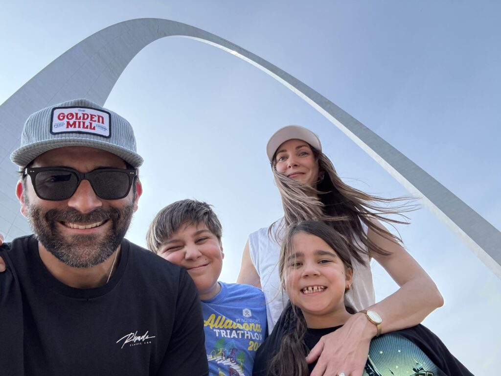 Family trip photo of Woody Brown at the St. Louis Gateway Arch—trusted Cumming, GA independent insurance agent